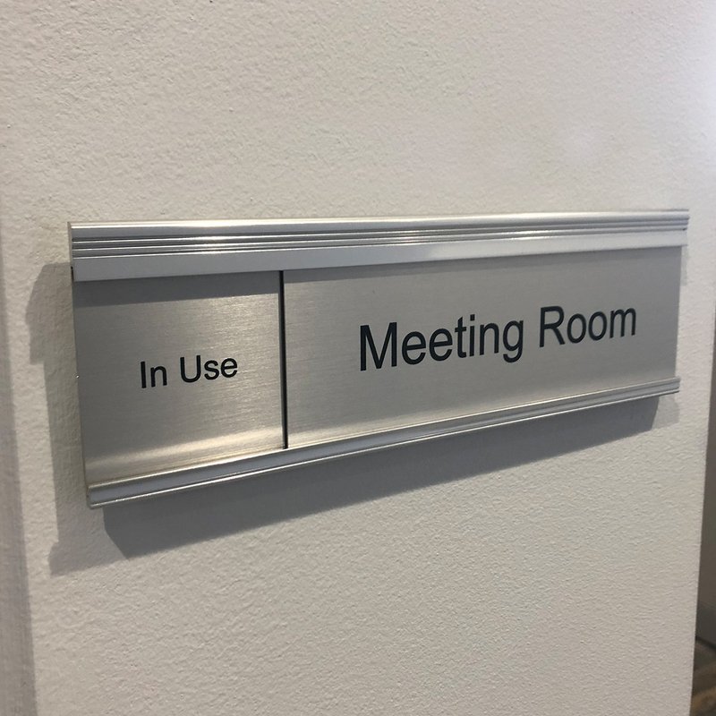 Meeting room slider sign